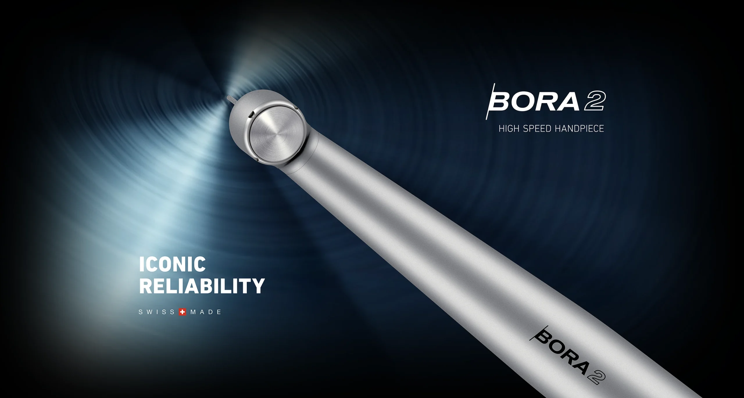 Front facing image of the BORA 2 high speed, air-driven handpiece with the text "Iconic reliability" written on it.